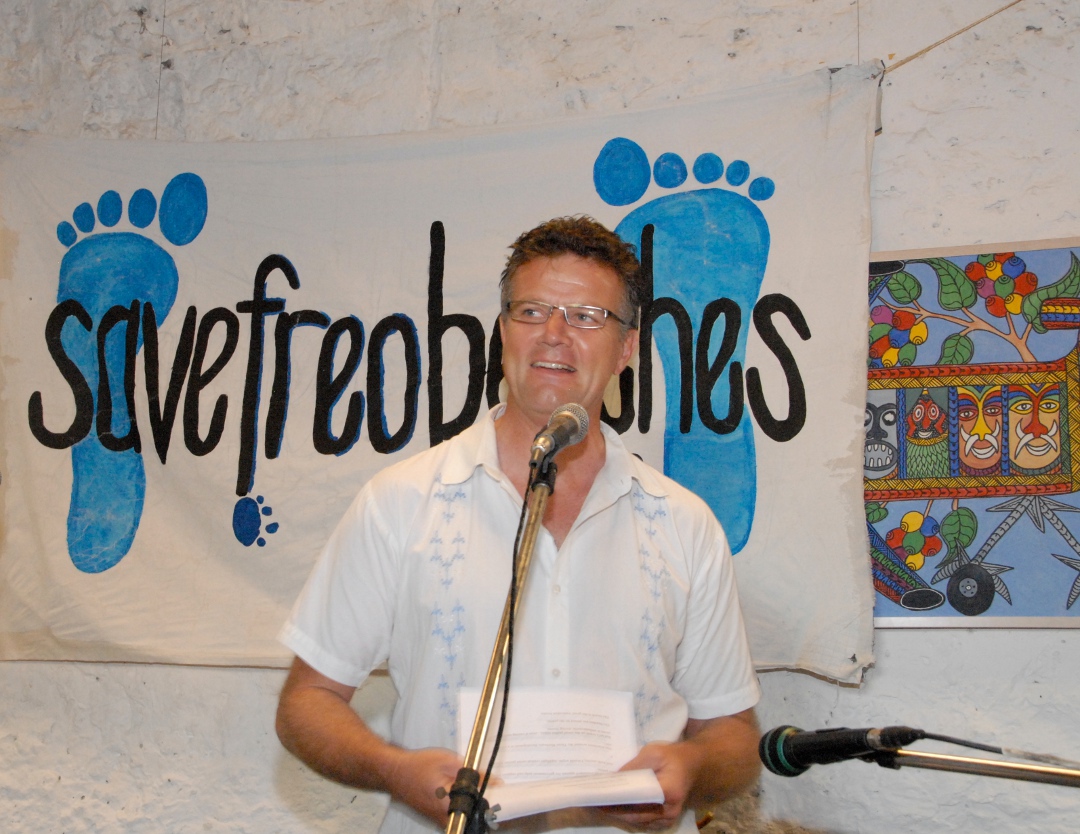 SFBA convenor giving speech before Save Freo Beaches banner